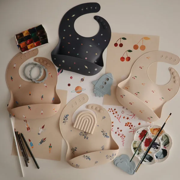 Mushie Silicone Baby Bib Rocket Ship