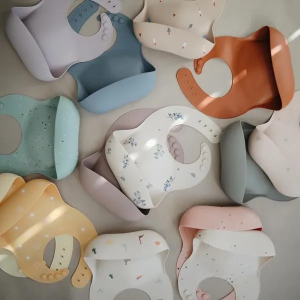 Mushie Silicone Baby Bib- Woodchuck